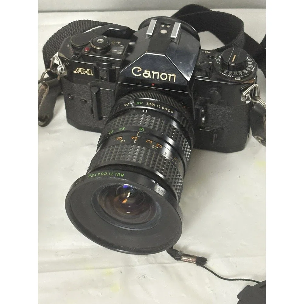 Canon A-1 35mm Film Camera with toyo optics 28mm 1:3.5 Lens and F=28-80  Tested
